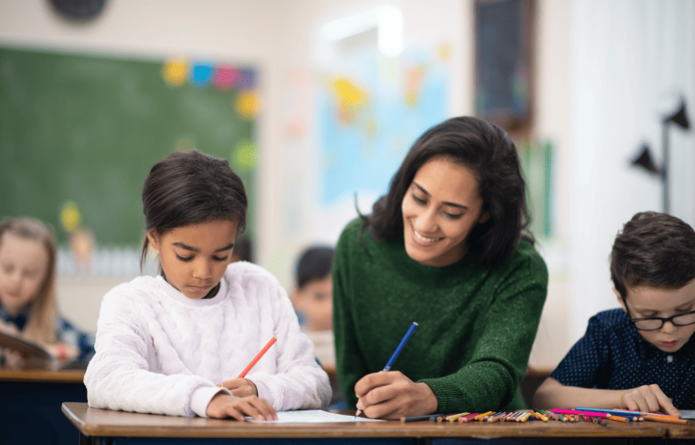 Teacher Helping Student